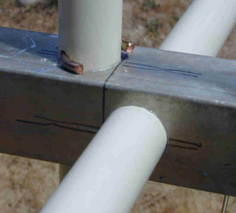 Closeup of spreader to boom attachment